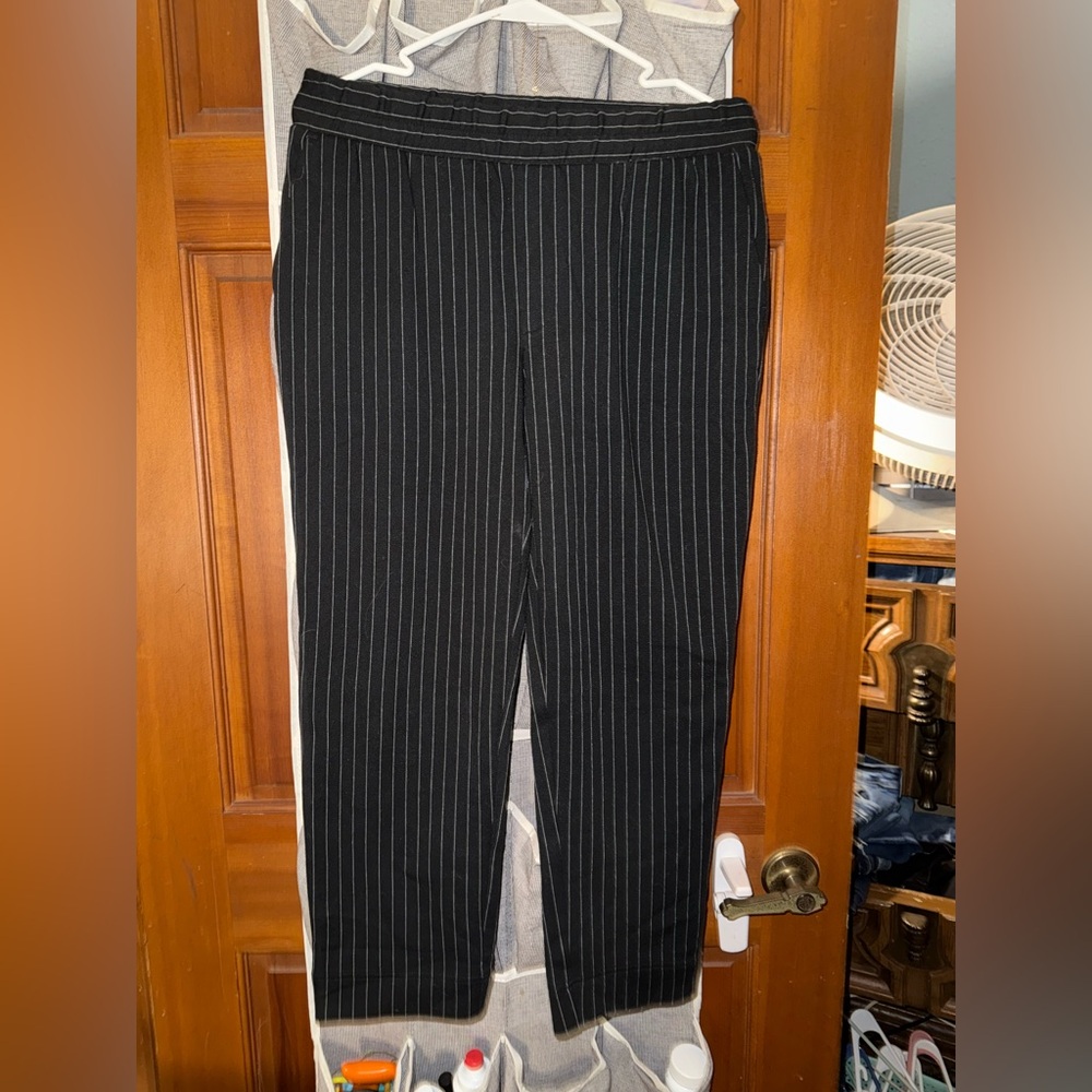 Size xsmall dress pants with strips on them